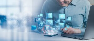 A,Person,Using,A,Smartphone,With,Social,Media,Icons,Floating