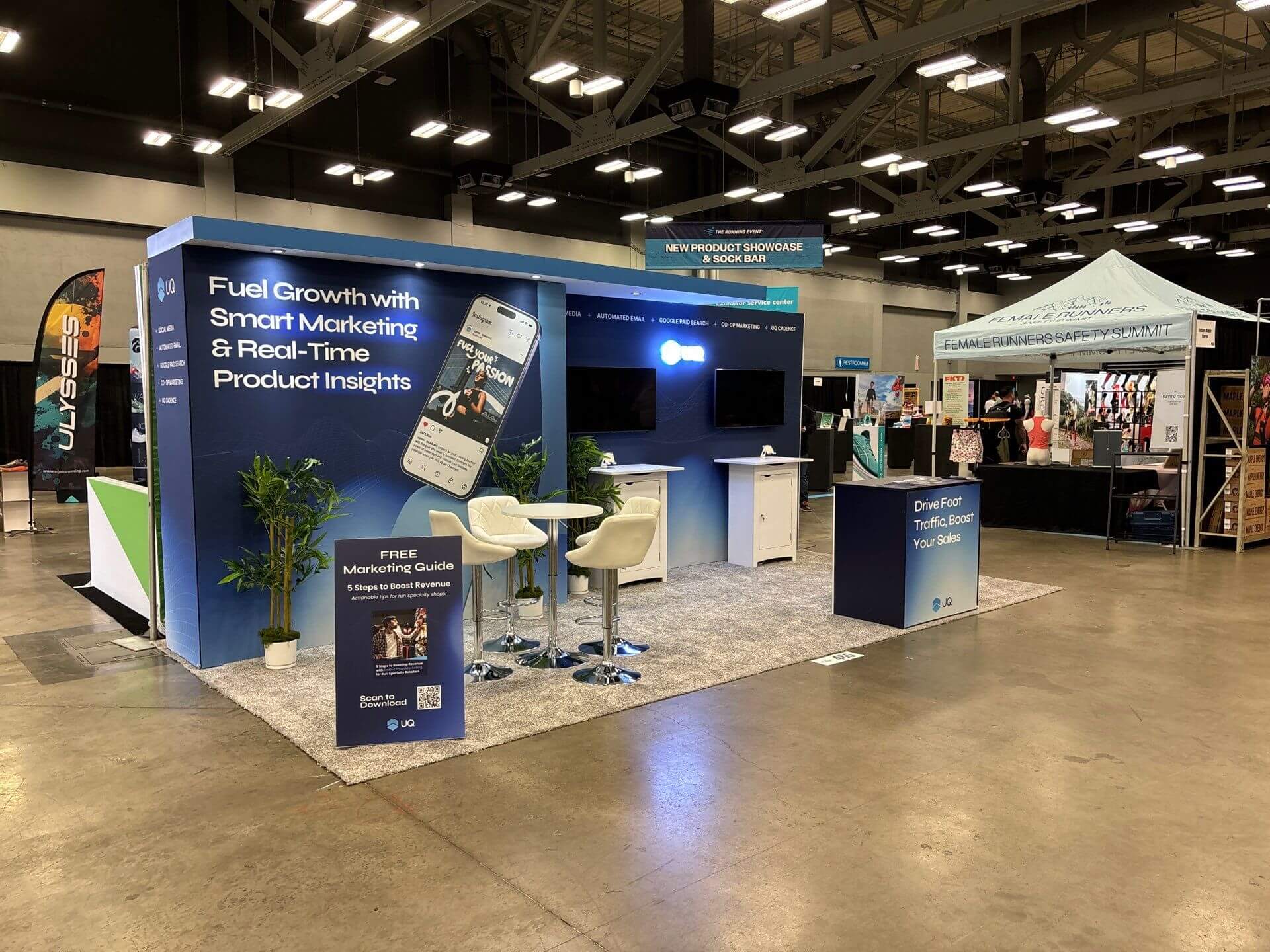 10x20 Trade Show booth Rental for UQ at The Running Event 2024, Designed and Built by Exponents in Austin, TX
