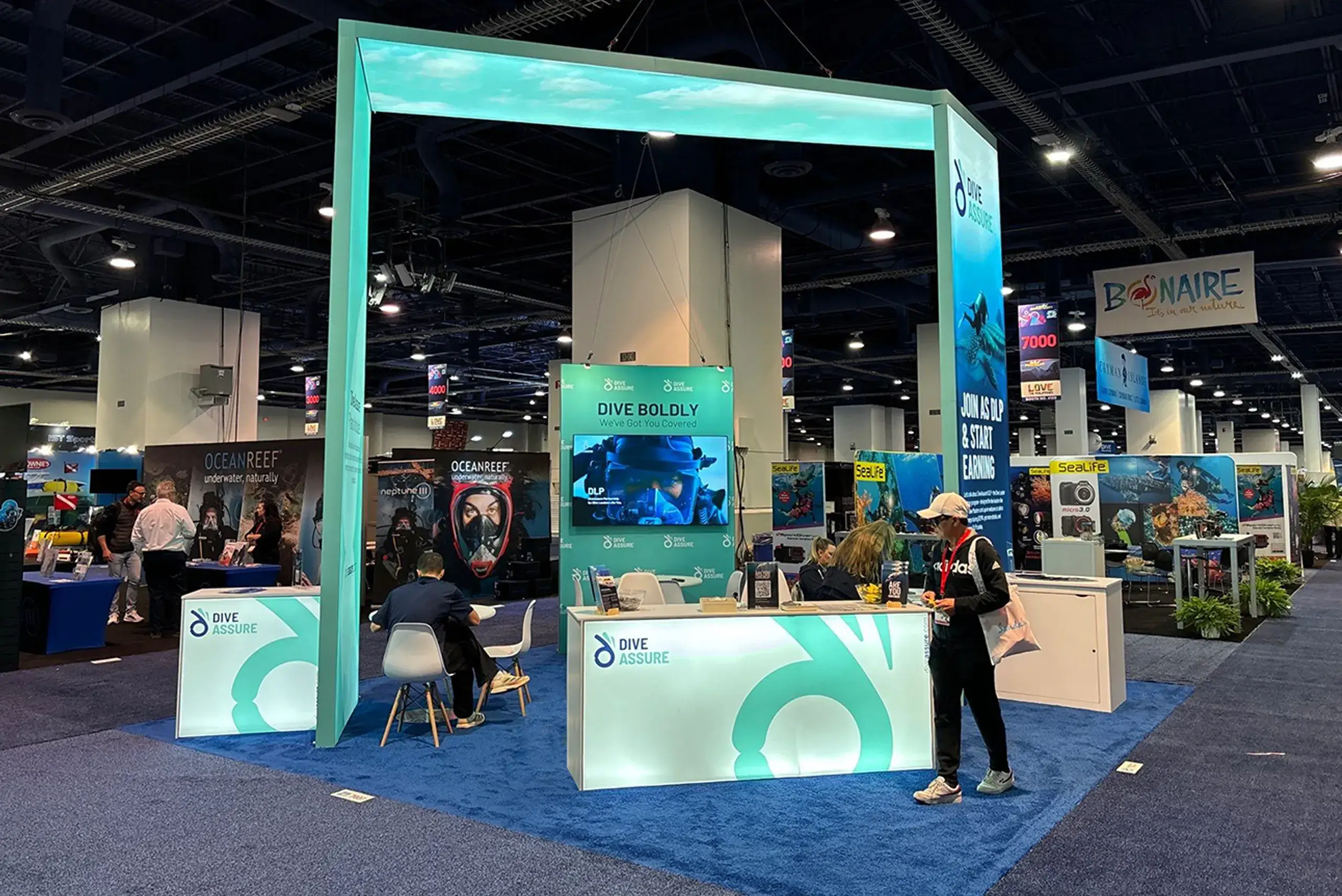 20x20 Exhibit Booth for Dive Assure at Dema, Built by Exponents in Las Vegas, NV