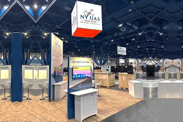  20x20 Turnkey Booth Rentals for NY UAS Test Site at AUVSI Xponential 2025, Designed and Built By Exponents in Houston, TX