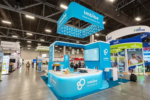 20x20 Custom Exhibit Rental for Imbibe at SupplySide Global, Designed and Built by Exponents in Las Vegas, NV