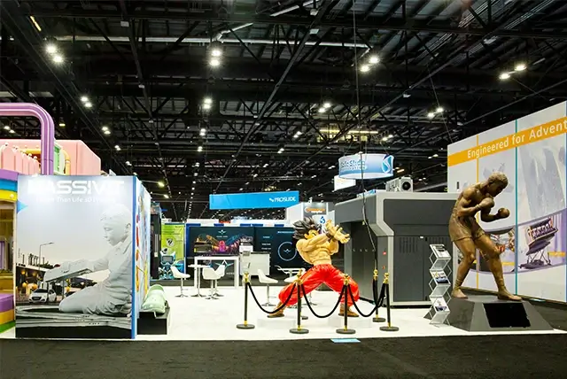 30x30 Trade Show Booth Rental for Massivit 3D at IAAPA, Designed and Built by Exponents in Orlando, FL