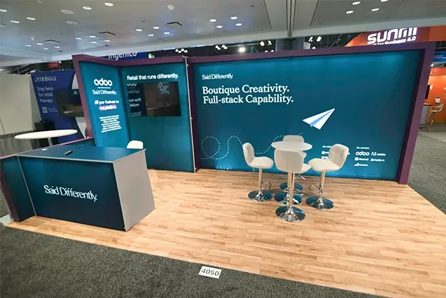 10x20 Trade show exhibit rental for Odoo & Brainvire 2 at NRF, Designed and Built by Exponents in New York, NY