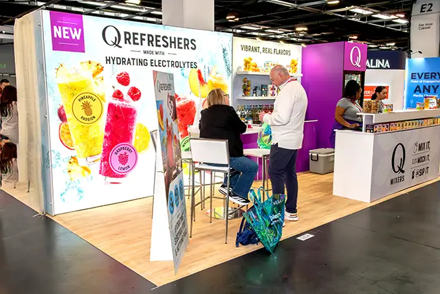 10x20 Trade Show Display Rental for Q Drinks at NPEW, Designed and Built by Exponents in Anaheim, CA